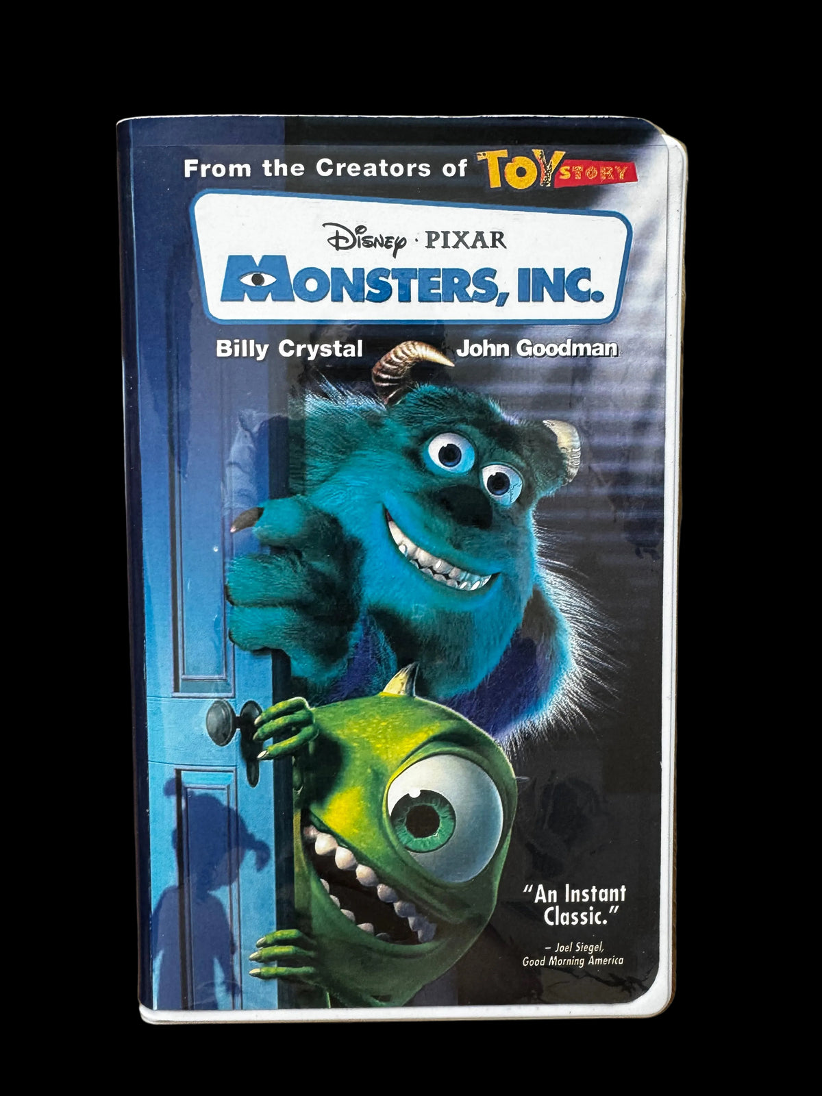 VHS Disney pin case Monsters Inc